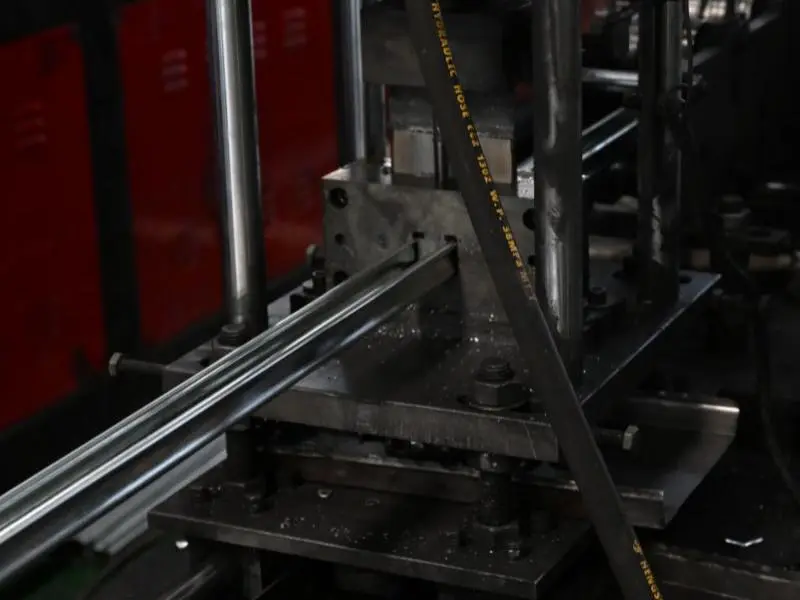 Continuous roll forming line for box beams and shelf supports