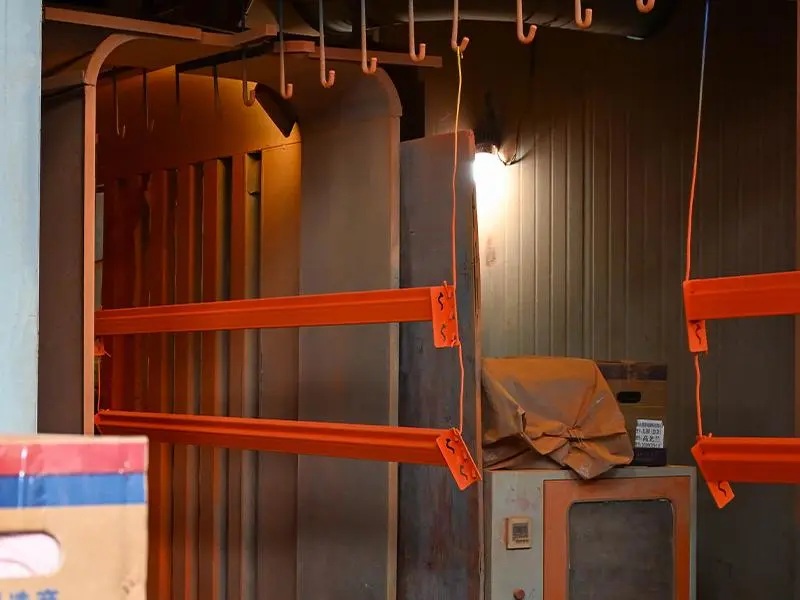 Continuous electrostatic powder coating line and curing oven